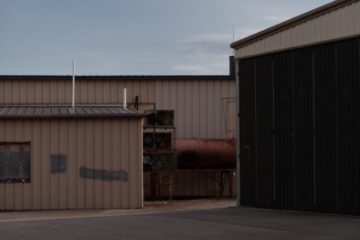 brown and gray steel building during daytime